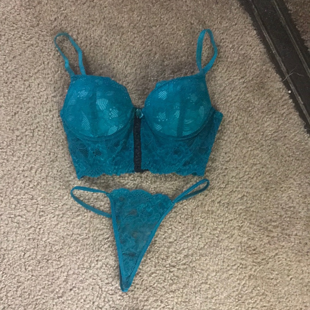 Aqua corset bustier and matching g string. Medium